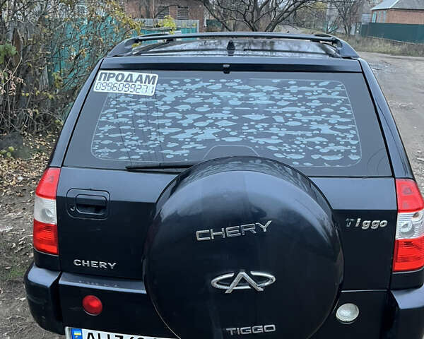 Черный Чери Тигго, объемом двигателя 2 л и пробегом 150 тыс. км за 3500 $, фото 4 на Automoto.ua