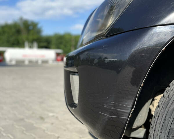 Чорний Чері Тігго, об'ємом двигуна 2 л та пробігом 156 тис. км за 3599 $, фото 12 на Automoto.ua