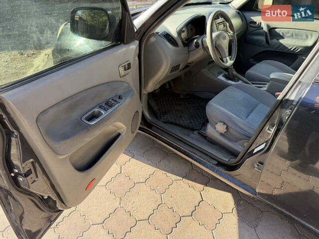Черный Чери Тигго, объемом двигателя 2.4 л и пробегом 333 тыс. км за 3000 $, фото 9 на Automoto.ua