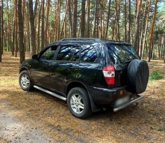 Чорний Чері Тігго, об'ємом двигуна 2 л та пробігом 167 тис. км за 3826 $, фото 1 на Automoto.ua