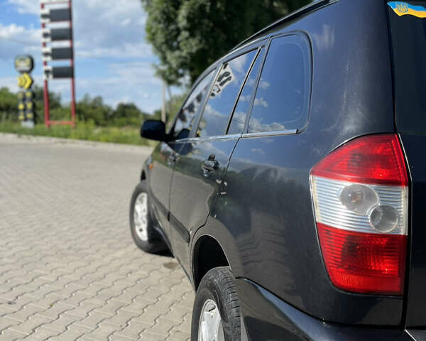 Чорний Чері Тігго, об'ємом двигуна 2 л та пробігом 156 тис. км за 3599 $, фото 10 на Automoto.ua