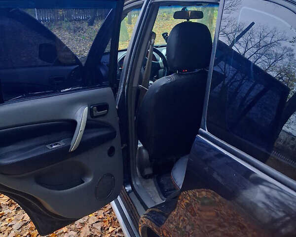 Чорний Чері Тігго, об'ємом двигуна 2 л та пробігом 240 тис. км за 3500 $, фото 6 на Automoto.ua