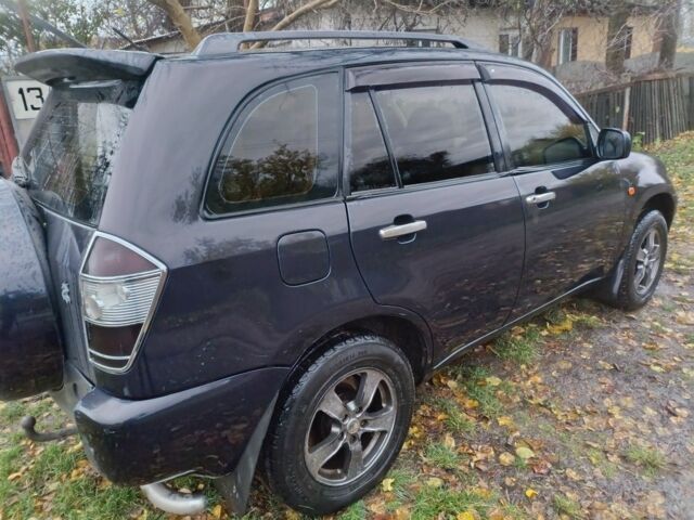 Черный Чери Тигго, объемом двигателя 2 л и пробегом 259 тыс. км за 4200 $, фото 3 на Automoto.ua