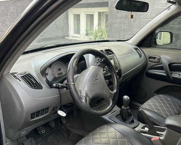 Черный Чери Тигго, объемом двигателя 2 л и пробегом 167 тыс. км за 3500 $, фото 10 на Automoto.ua