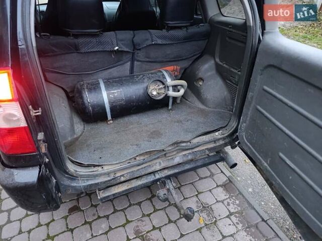 Чорний Чері Тігго, об'ємом двигуна 2 л та пробігом 231 тис. км за 2100 $, фото 5 на Automoto.ua