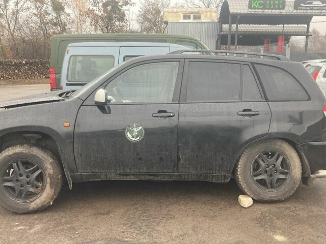 Чорний Чері Тігго, об'ємом двигуна 2 л та пробігом 225 тис. км за 1000 $, фото 12 на Automoto.ua