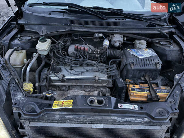 Черный Чери Тигго, объемом двигателя 2 л и пробегом 259 тыс. км за 3350 $, фото 22 на Automoto.ua