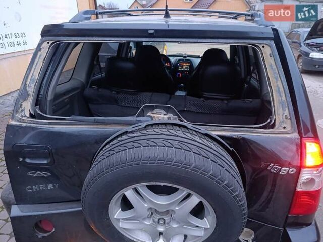 Чорний Чері Тігго, об'ємом двигуна 2 л та пробігом 231 тис. км за 2100 $, фото 14 на Automoto.ua