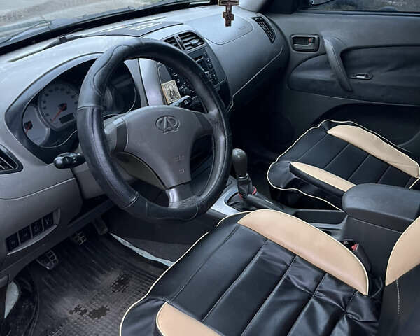 Черный Чери Тигго, объемом двигателя 2 л и пробегом 150 тыс. км за 3500 $, фото 5 на Automoto.ua