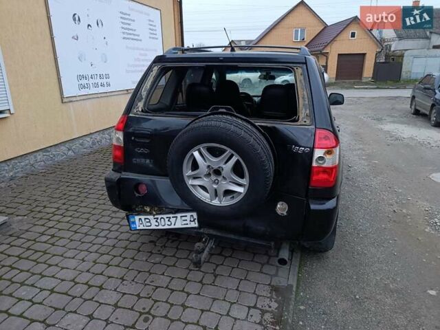 Чорний Чері Тігго, об'ємом двигуна 2 л та пробігом 231 тис. км за 2100 $, фото 22 на Automoto.ua