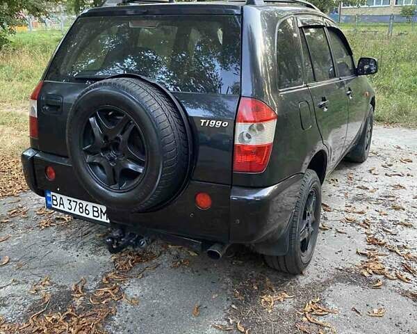 Чорний Чері Тігго, об'ємом двигуна 2 л та пробігом 228 тис. км за 4000 $, фото 6 на Automoto.ua