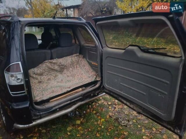 Черный Чери Тигго, объемом двигателя 2 л и пробегом 259 тыс. км за 4200 $, фото 1 на Automoto.ua