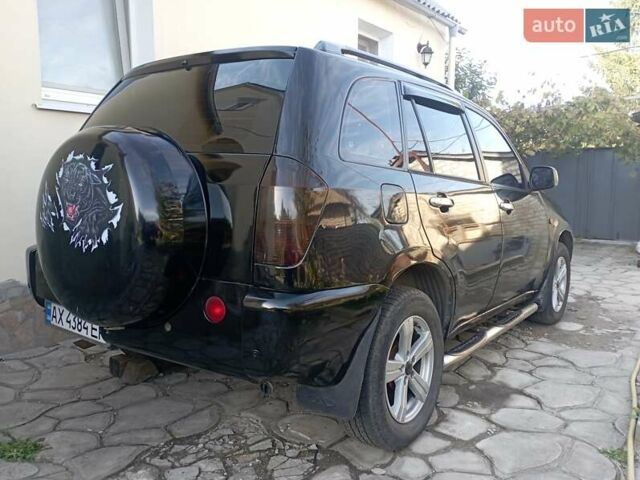 Чорний Чері Тігго, об'ємом двигуна 2 л та пробігом 169 тис. км за 4200 $, фото 10 на Automoto.ua