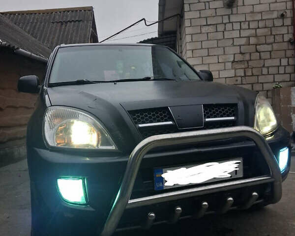 Чорний Чері Тігго, об'ємом двигуна 2 л та пробігом 240 тис. км за 3500 $, фото 9 на Automoto.ua