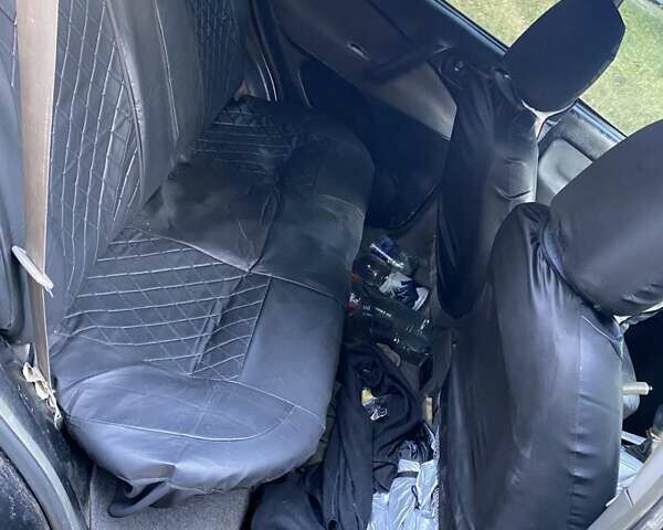 Чорний Чері Тігго, об'ємом двигуна 2 л та пробігом 228 тис. км за 4000 $, фото 1 на Automoto.ua