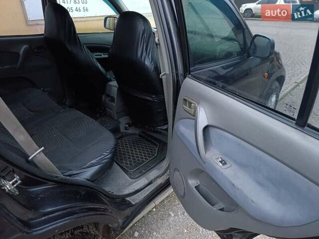 Чорний Чері Тігго, об'ємом двигуна 2 л та пробігом 231 тис. км за 2100 $, фото 24 на Automoto.ua