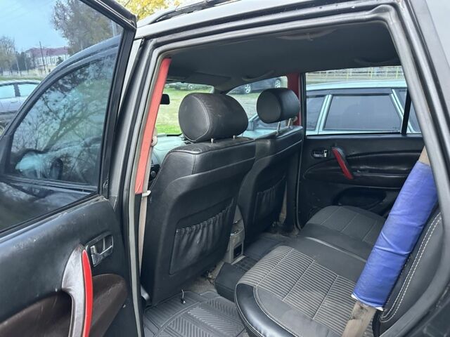 Чорний Чері Тігго, об'ємом двигуна 2 л та пробігом 200 тис. км за 3100 $, фото 7 на Automoto.ua