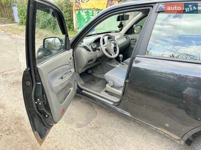 Черный Чери Тигго, объемом двигателя 2.35 л и пробегом 170 тыс. км за 2750 $, фото 12 на Automoto.ua