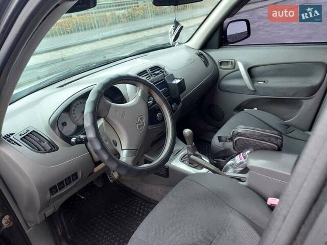 Чорний Чері Тігго, об'ємом двигуна 2 л та пробігом 436 тис. км за 3100 $, фото 16 на Automoto.ua