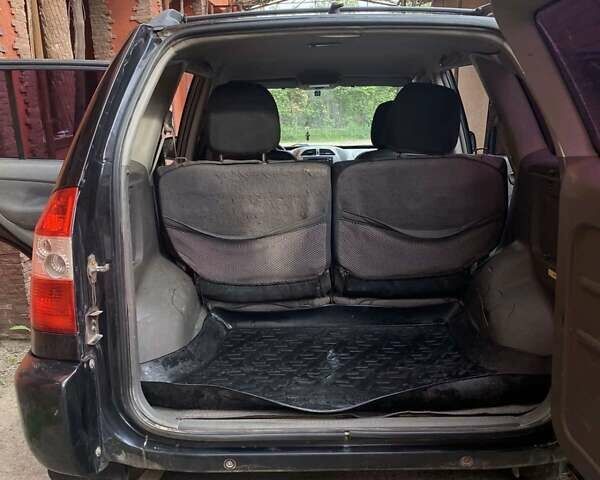 Чорний Чері Тігго, об'ємом двигуна 2 л та пробігом 113 тис. км за 4500 $, фото 11 на Automoto.ua