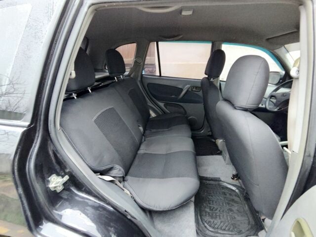 Чорний Чері Тігго, об'ємом двигуна 2 л та пробігом 170 тис. км за 4300 $, фото 7 на Automoto.ua