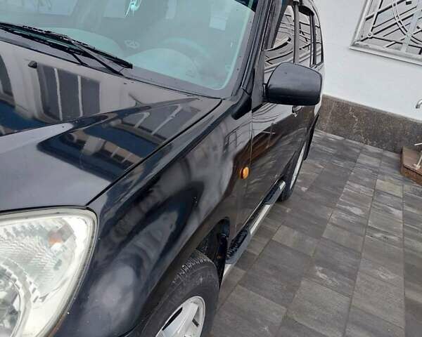 Чорний Чері Тігго, об'ємом двигуна 2 л та пробігом 436 тис. км за 3100 $, фото 2 на Automoto.ua