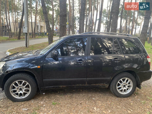 Черный Чери Тигго, объемом двигателя 2.4 л и пробегом 300 тыс. км за 3000 $, фото 5 на Automoto.ua