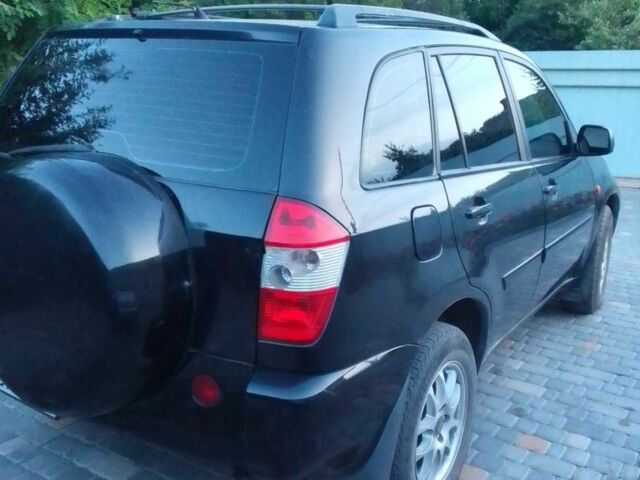 Черный Чери Тигго, объемом двигателя 2.4 л и пробегом 180 тыс. км за 4000 $, фото 2 на Automoto.ua