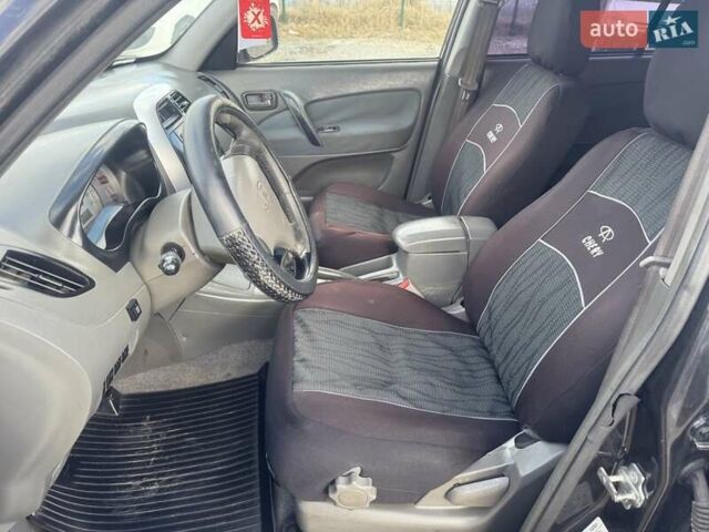 Черный Чери Тигго, объемом двигателя 2 л и пробегом 221 тыс. км за 2999 $, фото 31 на Automoto.ua