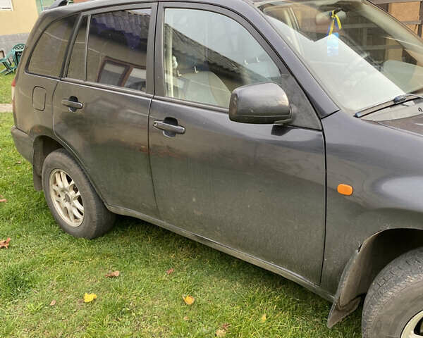 Черный Чери Тигго, объемом двигателя 2.4 л и пробегом 144 тыс. км за 4100 $, фото 2 на Automoto.ua