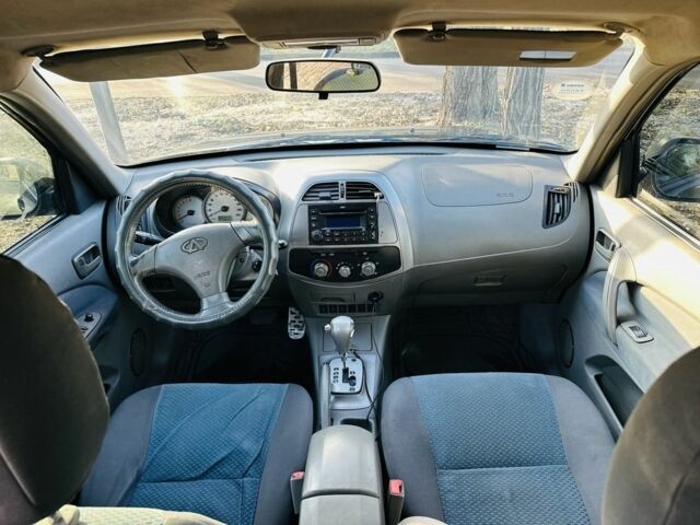 Черный Чери Тигго, объемом двигателя 2.4 л и пробегом 186 тыс. км за 3400 $, фото 13 на Automoto.ua