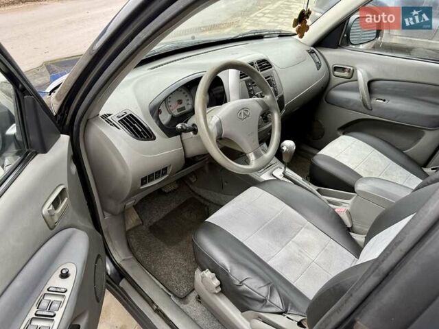 Черный Чери Тигго, объемом двигателя 2.35 л и пробегом 192 тыс. км за 3500 $, фото 9 на Automoto.ua