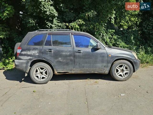 Черный Чери Тигго, объемом двигателя 2.35 л и пробегом 200 тыс. км за 1250 $, фото 4 на Automoto.ua