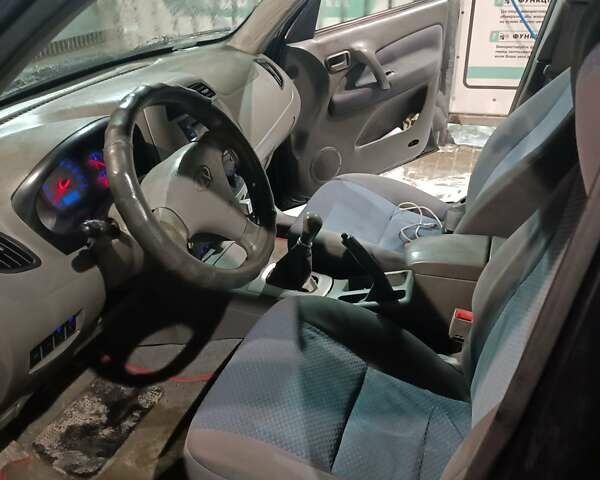 Чорний Чері Тігго, об'ємом двигуна 2 л та пробігом 110 тис. км за 2500 $, фото 5 на Automoto.ua