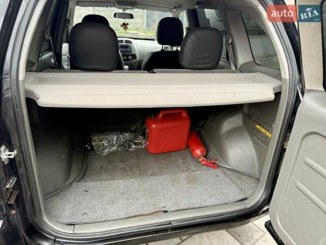 Черный Чери Тигго, объемом двигателя 2.35 л и пробегом 192 тыс. км за 3500 $, фото 11 на Automoto.ua