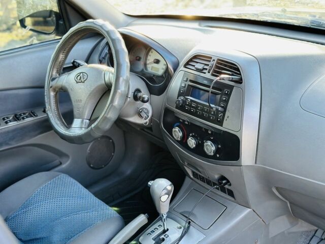 Черный Чери Тигго, объемом двигателя 2.4 л и пробегом 186 тыс. км за 3400 $, фото 12 на Automoto.ua