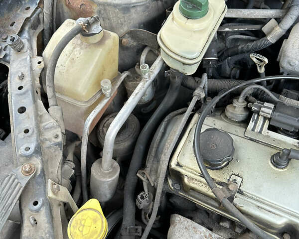 Черный Чери Тигго, объемом двигателя 2.35 л и пробегом 170 тыс. км за 2750 $, фото 17 на Automoto.ua