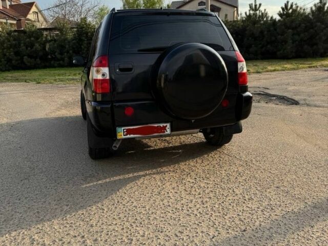 Черный Чери Тигго, объемом двигателя 2 л и пробегом 84 тыс. км за 3999 $, фото 4 на Automoto.ua