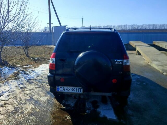 Черный Чери Тигго, объемом двигателя 24 л и пробегом 160 тыс. км за 4600 $, фото 4 на Automoto.ua