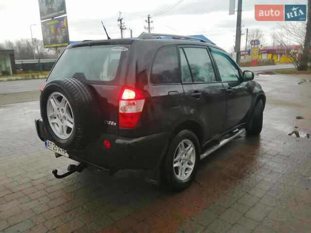 Чорний Чері Тігго, об'ємом двигуна 2 л та пробігом 248 тис. км за 4100 $, фото 1 на Automoto.ua