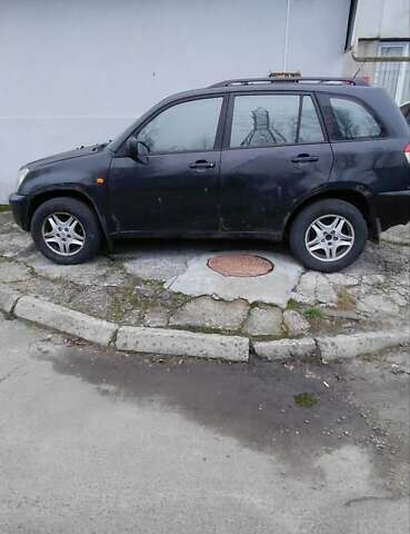 Чорний Чері Тігго, об'ємом двигуна 2 л та пробігом 287 тис. км за 2700 $, фото 2 на Automoto.ua