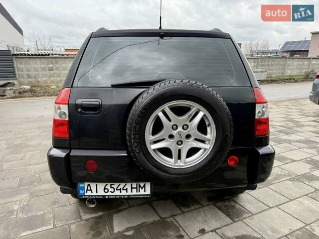 Черный Чери Тигго, объемом двигателя 2.35 л и пробегом 192 тыс. км за 3500 $, фото 3 на Automoto.ua