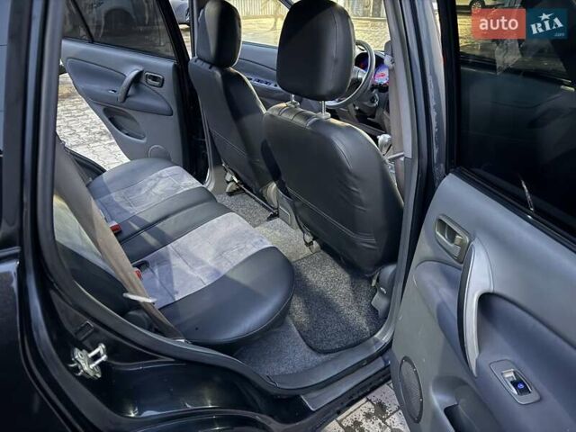 Чорний Чері Тігго, об'ємом двигуна 2.4 л та пробігом 194 тис. км за 3000 $, фото 12 на Automoto.ua