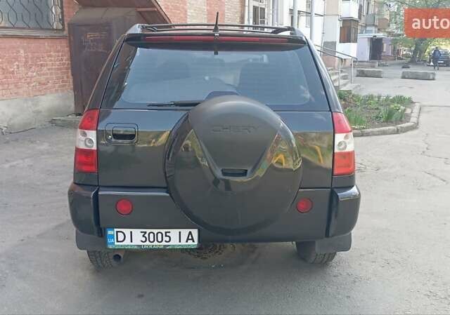 Черный Чери Тигго, объемом двигателя 2.4 л и пробегом 300 тыс. км за 4100 $, фото 2 на Automoto.ua