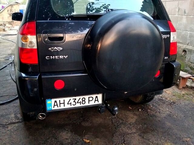 Черный Чери Тигго, объемом двигателя 2 л и пробегом 224 тыс. км за 4950 $, фото 1 на Automoto.ua