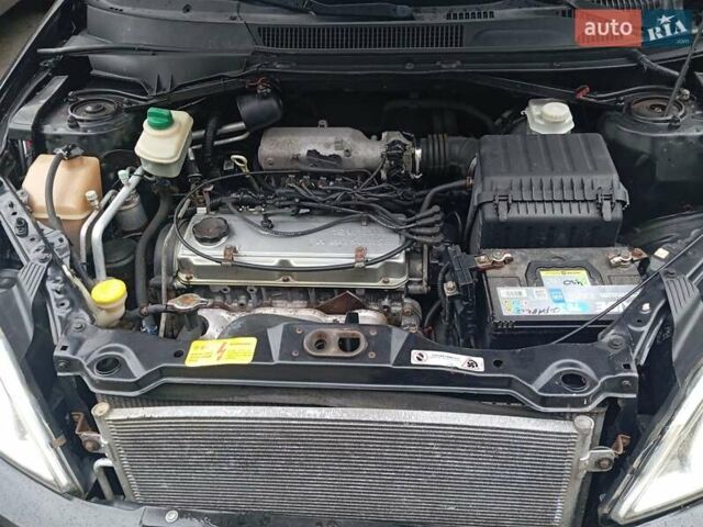 Чорний Чері Тігго, об'ємом двигуна 2 л та пробігом 130 тис. км за 3700 $, фото 7 на Automoto.ua