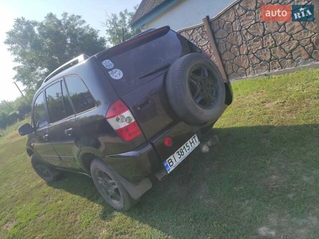 Черный Чери Тигго, объемом двигателя 2.35 л и пробегом 250 тыс. км за 3500 $, фото 7 на Automoto.ua