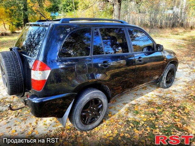 Чорний Чері Тігго, об'ємом двигуна 2 л та пробігом 177 тис. км за 3800 $, фото 4 на Automoto.ua