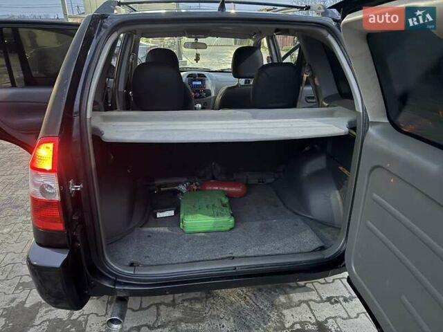 Чорний Чері Тігго, об'ємом двигуна 2.4 л та пробігом 194 тис. км за 3000 $, фото 11 на Automoto.ua