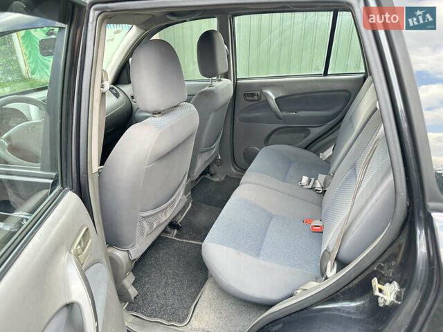 Черный Чери Тигго, объемом двигателя 2.35 л и пробегом 170 тыс. км за 2750 $, фото 14 на Automoto.ua